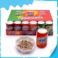 Kola şeklindeki kavanozda tatlı tablet şeker 